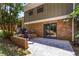 Backyard patio leads to a large backyard with lush green grass and a swimming pool for summer fun at 579 Chapman Dr, Marietta, GA 30066