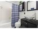 Modern bathroom featuring vanity sink and tiled shower at 579 Chapman Dr, Marietta, GA 30066