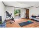 Bright lower level exercise room with access to the outdoor patio and backyard at 579 Chapman Dr, Marietta, GA 30066
