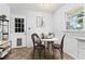 Bright eat-in kitchen area, with a view to the backyard, enhanced with virtual staging at 579 Chapman Dr, Marietta, GA 30066
