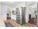 Spacious kitchen with stainless steel appliances, hardwood floors, and views to other rooms at 579 Chapman Dr, Marietta, GA 30066