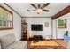 Cozy living room with wood floors and entertainment center at 579 Chapman Dr, Marietta, GA 30066