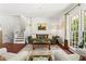 Cozy living room with hardwood floors, comfortable seating, and natural light at 579 Chapman Dr, Marietta, GA 30066