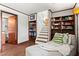 Inviting living room featuring wood trim, and easy access to bathroom and stairway at 579 Chapman Dr, Marietta, GA 30066