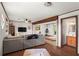 Spacious living room featuring wood floors, fan and comfortable seating at 579 Chapman Dr, Marietta, GA 30066