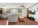 Bright living room featuring fan, wood floors, sofa and natural light at 579 Chapman Dr, Marietta, GA 30066