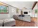 Comfortable living room featuring wood floors and large windows at 579 Chapman Dr, Marietta, GA 30066