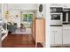 Bright living space with hardwood floors, a glimpse of the pool, and cozy furnishings at 579 Chapman Dr, Marietta, GA 30066