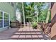 Spacious wooden back deck, ideal for outdoor entertaining and relaxing with its natural wood finish at 335 Pintail Ct, Suwanee, GA 30024