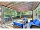 Relaxing outdoor patio area with comfortable seating, perfect for enjoying the serene backyard setting at 335 Pintail Ct, Suwanee, GA 30024