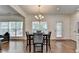 Dining area with hardwood floors near a bright living room space at 335 Pintail Ct, Suwanee, GA 30024