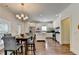 Eat-in kitchen with stainless appliances and an island at 335 Pintail Ct, Suwanee, GA 30024