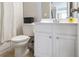 Clean, well-maintained bathroom with a white vanity and neutral decor, for a modern feel at 4765 Silver Leaf Dr, Cumming, GA 30040
