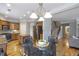 Spacious kitchen with stainless steel appliances, granite countertops, and a breakfast nook at 4765 Silver Leaf Dr, Cumming, GA 30040
