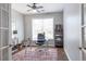 Home office with large window, natural light, and a comfortable workspace at 4765 Silver Leaf Dr, Cumming, GA 30040