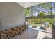 Covered patio with outdoor seating and a view of the backyard at 4765 Silver Leaf Dr, Cumming, GA 30040