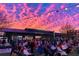 Town Center at dusk with residents gathering for an outdoor event at 4765 Silver Leaf Dr, Cumming, GA 30040