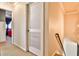 Hallway with closet, carpeted floors and view to another room at 705 Chanson Sw Dr, Marietta, GA 30064