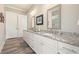 Bathroom featuring granite countertops, double sinks, and modern fixtures at 287 Flower Farm Dr, Acworth, GA 30101