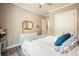 Inviting bedroom showcases wood-look flooring and large windows at 287 Flower Farm Dr, Acworth, GA 30101