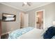 Relaxing bedroom showcasing access to walk-in closet and ensuite bathroom at 287 Flower Farm Dr, Acworth, GA 30101