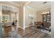 Dining room has hardwood floors and views of the living room with lots of natural light at 287 Flower Farm Dr, Acworth, GA 30101