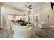 Open-concept living area with views of the kitchen, hardwood flooring, and neutral paint at 287 Flower Farm Dr, Acworth, GA 30101