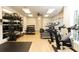Bright gym space with stationary bikes, treadmills, free weights, and mirrored wall at 3900 Danube Ln, Atlanta, GA 30339