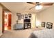Comfortable bedroom with plush carpeting, ceiling fan, and stylish decor at 4915 Millers Trce, Peachtree Corners, GA 30096