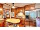 Modern kitchen featuring stainless steel appliances, granite countertops, and center butcher block island at 4915 Millers Trce, Peachtree Corners, GA 30096