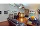 Spacious living room with stone fireplace, vaulted ceilings, hardwood floors, and natural light at 4915 Millers Trce, Peachtree Corners, GA 30096