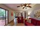 Bright living room with hardwood floors and access to the back deck at 4915 Millers Trce, Peachtree Corners, GA 30096