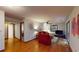 Spacious living room with hardwood floors, ceiling fan and bright natural light at 4915 Millers Trce, Peachtree Corners, GA 30096