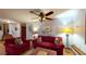 Cozy living room with hardwood floors and a ceiling fan, providing an inviting space at 4915 Millers Trce, Peachtree Corners, GA 30096