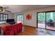 Open living room with hardwood floors and deck access, perfect for entertaining at 4915 Millers Trce, Peachtree Corners, GA 30096