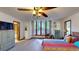 Open bedroom features large window, closet and ceiling fan at 4915 Millers Trce, Peachtree Corners, GA 30096