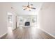 Bright living room featuring hardwood floors and a fireplace at 500 Rosehill Dr, Mcdonough, GA 30253