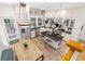 Bright kitchen featuring stainless steel appliances, a large island, and an adjacent dining area at 966 Blue Ridge Ne Ave, Atlanta, GA 30306