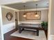 Stylish game room with a pool table, modern lighting, hardwood floors, and decorative wall art at 970 Tarpley Nw Rd, Kennesaw, GA 30152