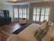 Bright main bedroom with a seating area and a large window for natural light at 970 Tarpley Nw Rd, Kennesaw, GA 30152