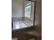 Modern bathtub with a tiled surround, glass partition, and a built-in corner seat at 2424 Saint Andrews Rdg, College Park, GA 30337