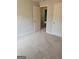 Neutral bedroom with carpet flooring, offering access to the closet and adjacent room at 2424 Saint Andrews Rdg, College Park, GA 30337