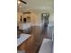 Open-concept living area with hardwood floors and lots of natural light at 2424 Saint Andrews Rdg, College Park, GA 30337