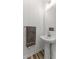 Charming half bathroom with a pedestal sink and classic fixtures at 3560 Bexton Dr, Duluth, GA 30097