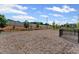 Fenced community dog park with benches, trees, and open space for recreation and leisure at 3560 Bexton Dr, Duluth, GA 30097