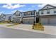 Exterior view of a new townhome with two car garage at 3560 Bexton Dr, Duluth, GA 30097