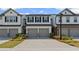 Charming townhome with two-car garage and well-manicured landscaping at 3560 Bexton Dr, Duluth, GA 30097