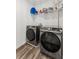 Practical laundry room featuring modern washer and dryer units at 3560 Bexton Dr, Duluth, GA 30097