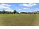 Expansive, well-maintained green lawn area offers residents a shared space for recreation and relaxation at 3560 Bexton Dr, Duluth, GA 30097