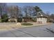 Community entrance featuring stone signage and a small guard house at 1932 Variations Ne Dr, Atlanta, GA 30329